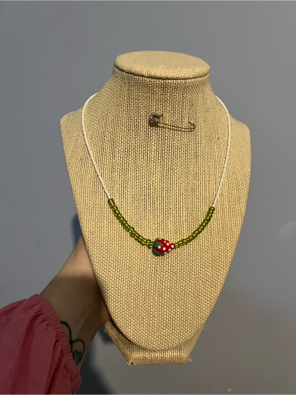 #177. Handmade Green Beaded Necklace with Red Mushroom Pendant